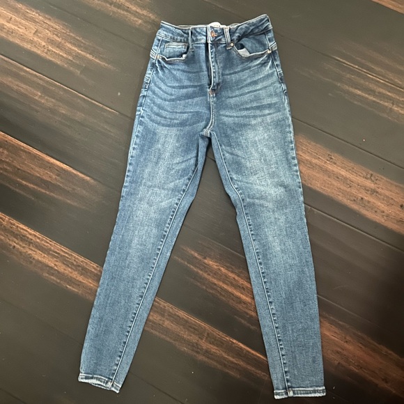 Denim - Medium Wash High Rise Jeans with Slim Fit and Tapered Legs